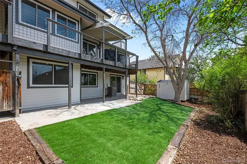 a view of a yard in front of a house