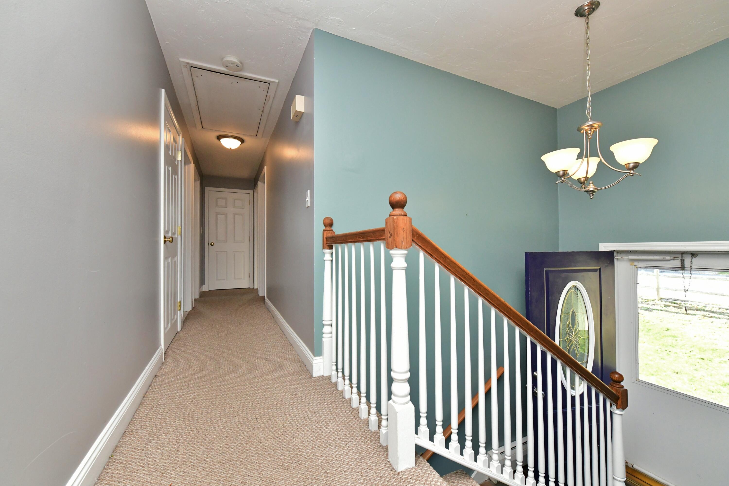 65 Siasconset Drive Sagamore Beach, MA 02562 - Photo 20 of 53 a view of a balcony with staircase