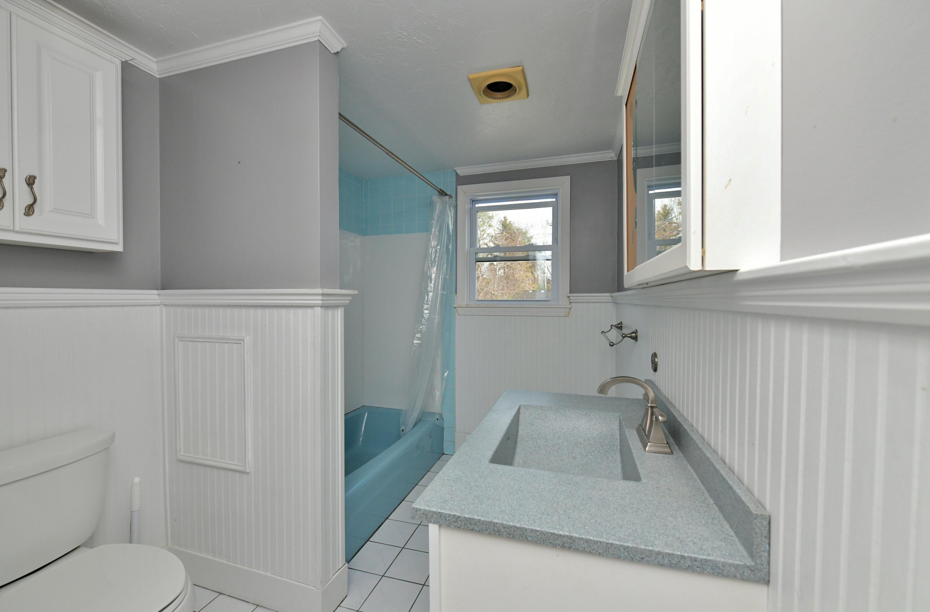 65 Siasconset Drive Sagamore Beach, MA 02562 - Photo 21 of 53 a bathroom with a sink toilet and tub