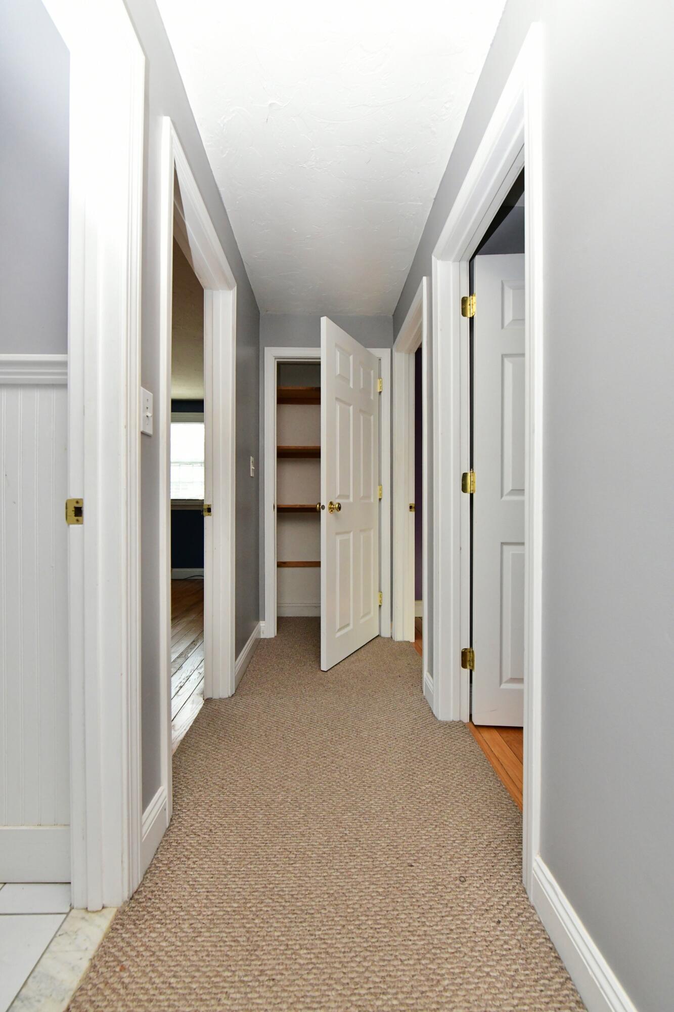 65 Siasconset Drive Sagamore Beach, MA 02562 - Photo 28 of 53 an empty room with closet and mirrors