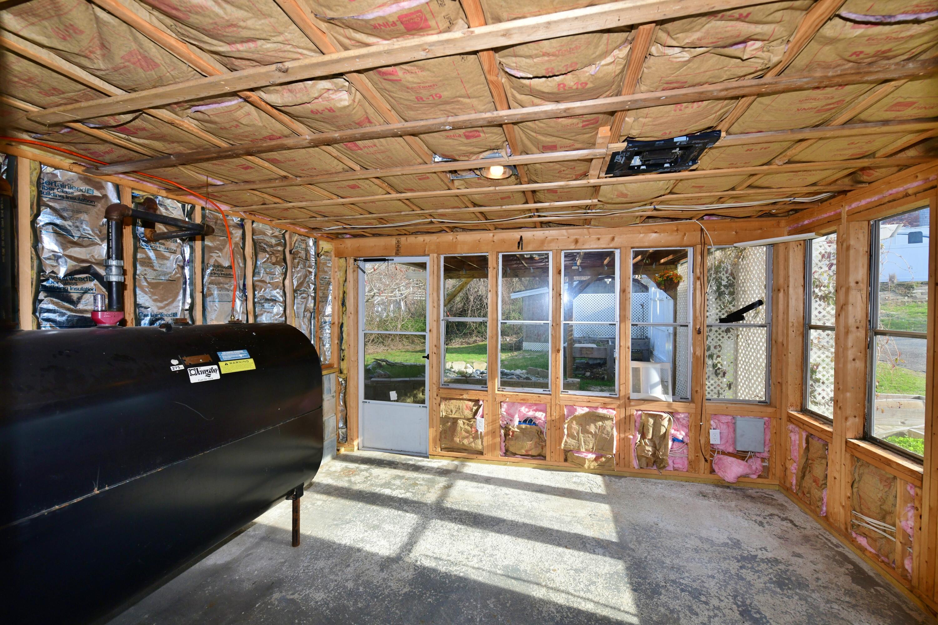 65 Siasconset Drive Sagamore Beach, MA 02562 - Photo 33 of 53 a building outdoor space with patio furniture and garden