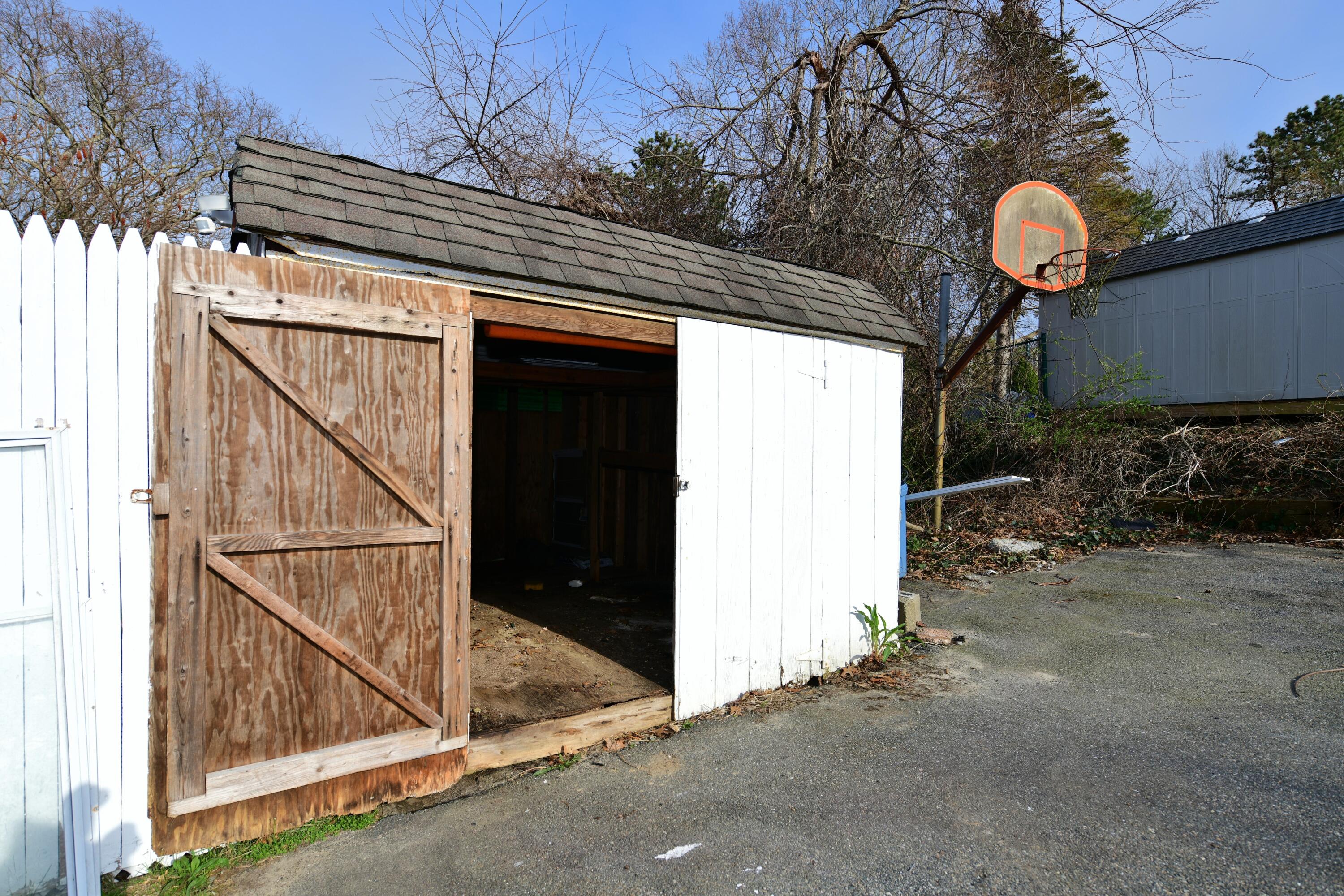 65 Siasconset Drive Sagamore Beach, MA 02562 - Photo 42 of 53 a front view of a house with a yard