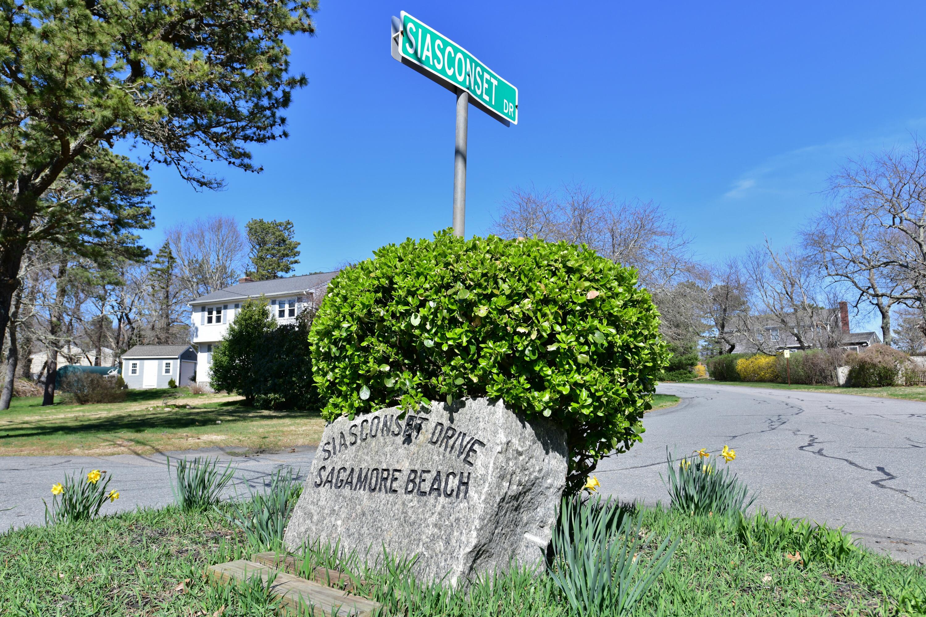 65 Siasconset Drive Sagamore Beach, MA 02562 - Photo 53 of 53 a view of a park with a house in the background