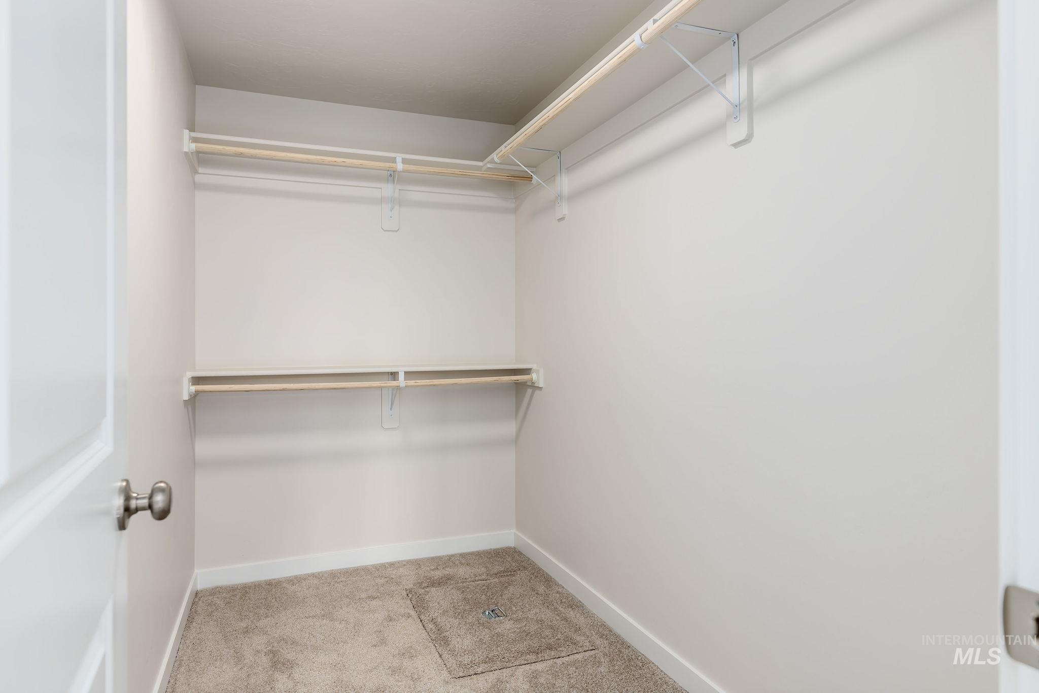 11363 Bluefield Drive Caldwell, ID 83605 - Photo 15 of 35 Spacious closet featuring light colored carpet