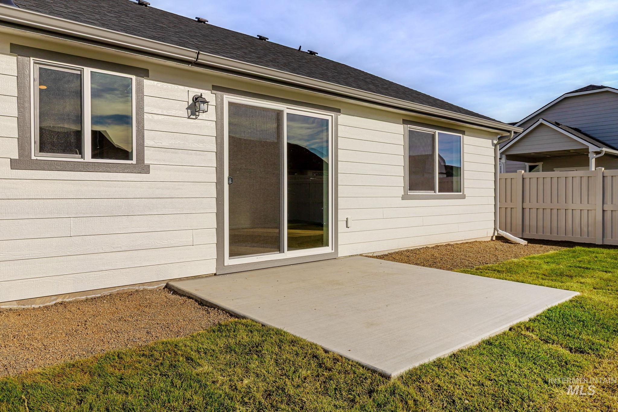 11363 Bluefield Drive Caldwell, ID 83605 - Photo 26 of 35 Back of property featuring a patio