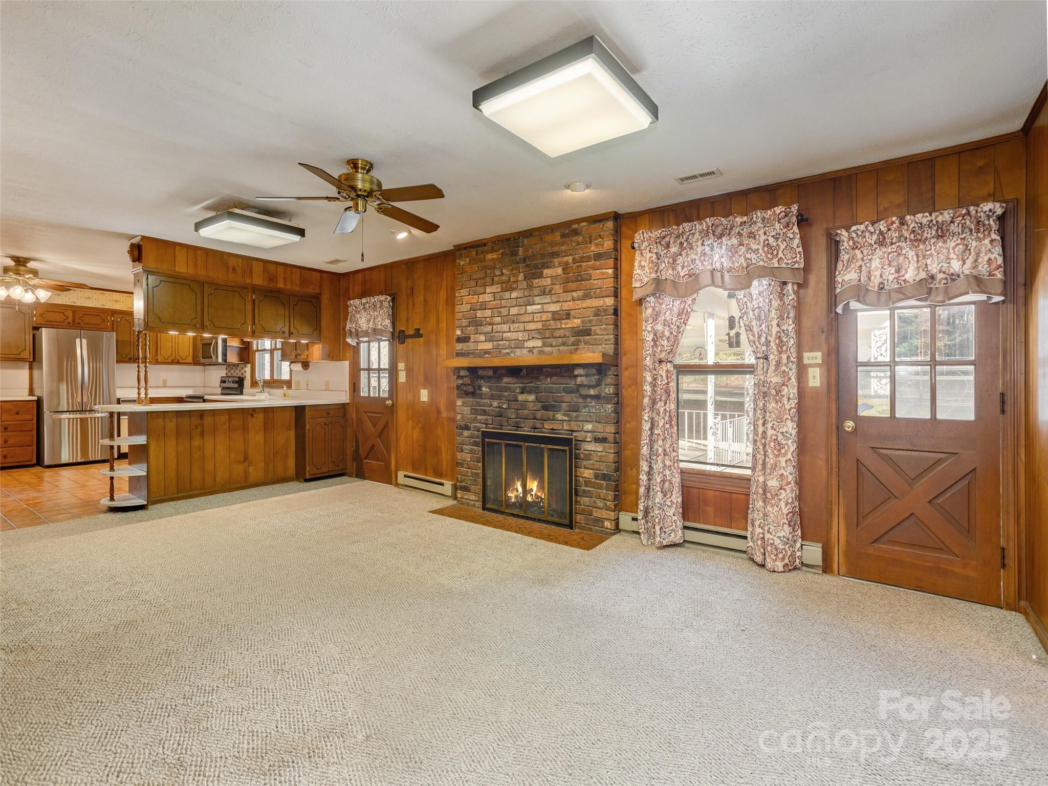2640 Haywood Road Hendersonville, NC 28791 - Photo 13 of 41 a view of a livingroom with furniture and a fireplace