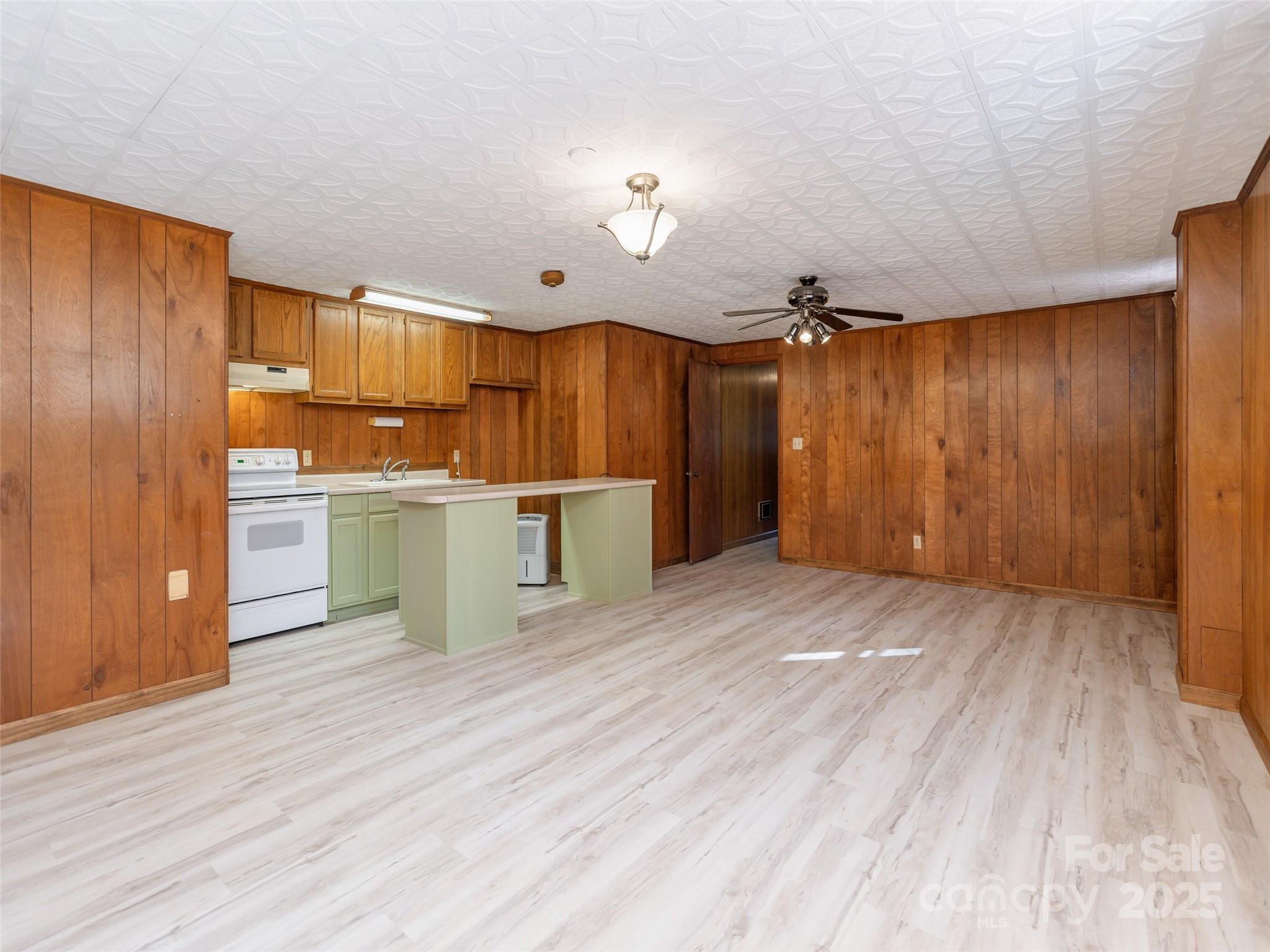 2640 Haywood Road Hendersonville, NC 28791 - Photo 27 of 41 a view of kitchen with wooden floor and electronic appliances