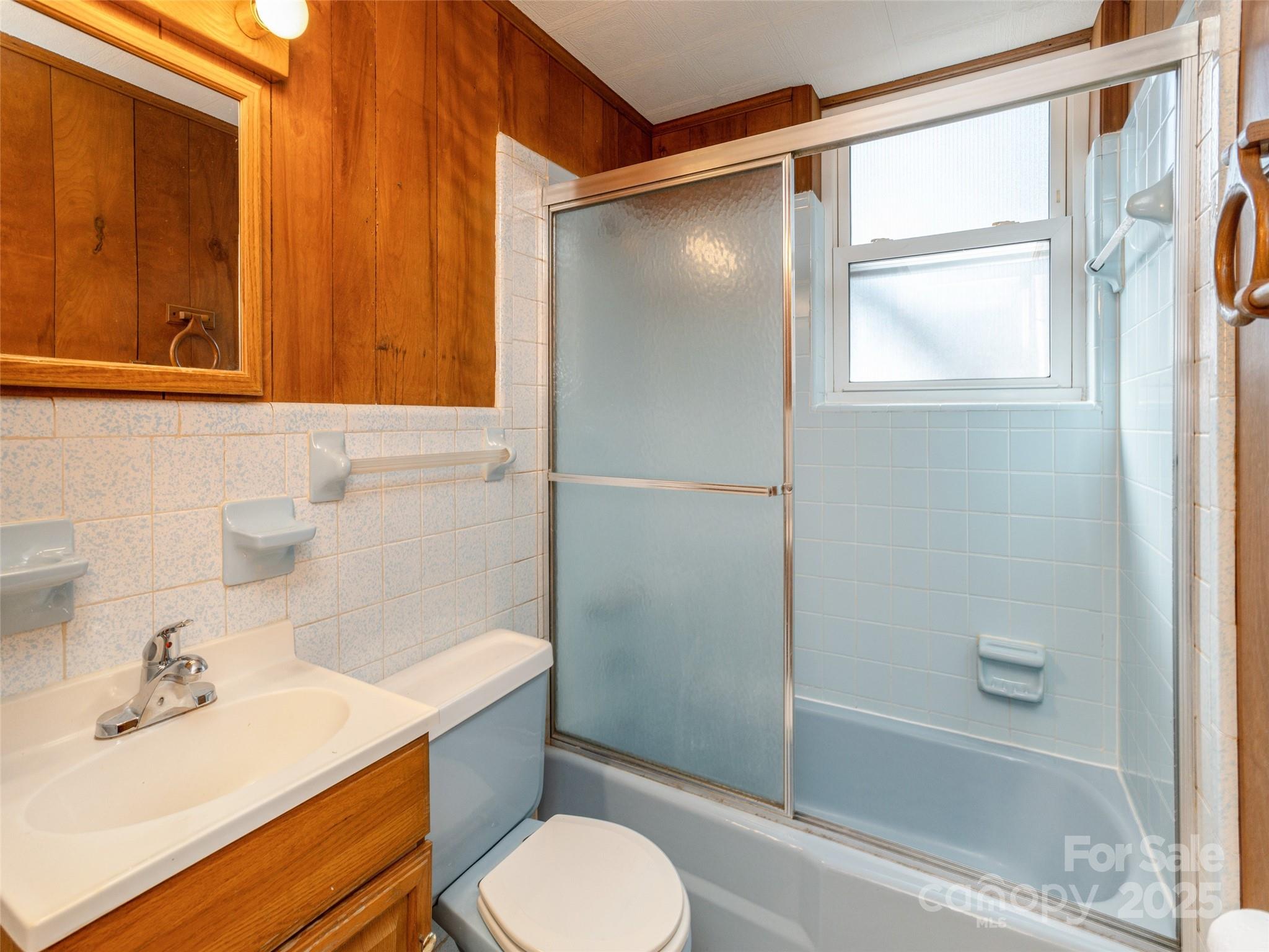 2640 Haywood Road Hendersonville, NC 28791 - Photo 29 of 41 a bathroom with a sink toilet and shower