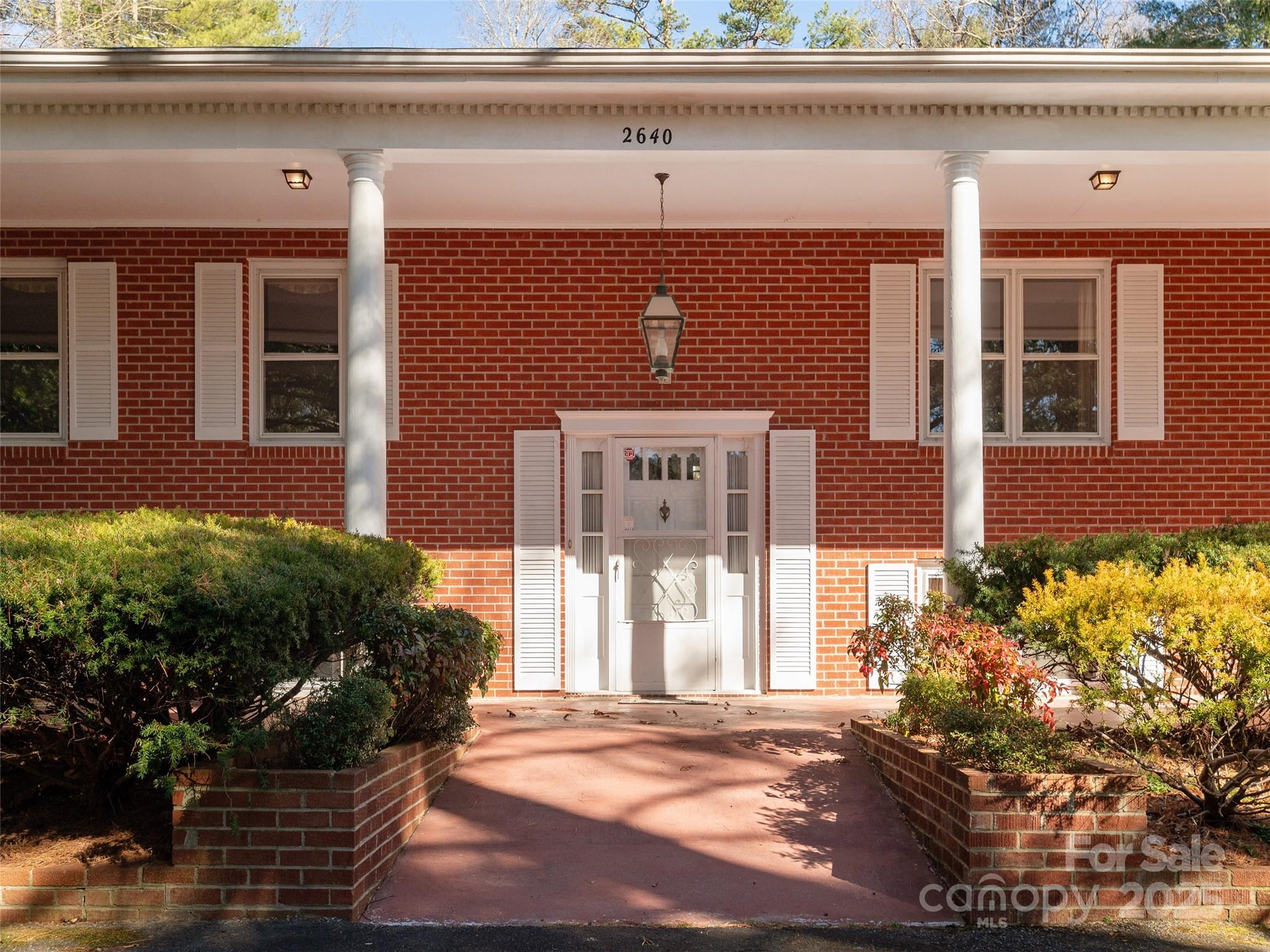 2640 Haywood Road Hendersonville, NC 28791 - Photo 4 of 41 a front view of a house