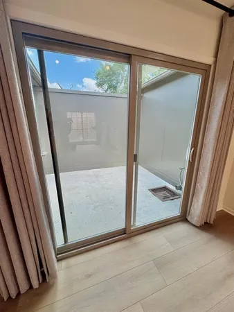 a kitchen with stainless steel appliances kitchen island a sink stove and cabinets