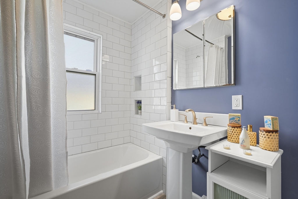 5 Grant Street, Unit 5 Easthampton, MA 01027 - Photo 20 of 36 a bathroom with a sink and a bathtub
