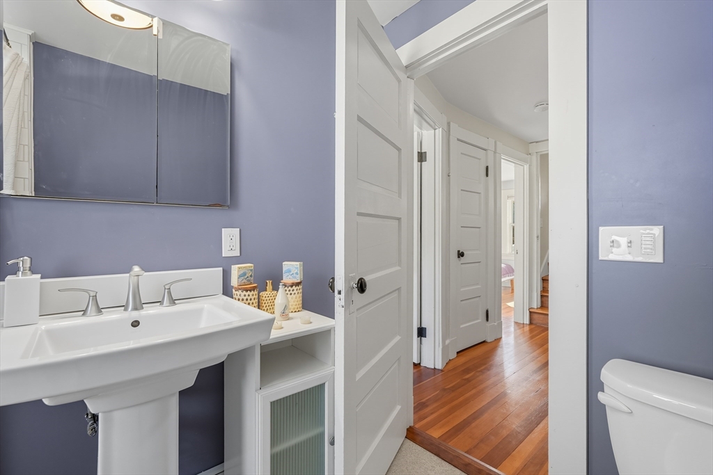 5 Grant Street, Unit 5 Easthampton, MA 01027 - Photo 21 of 36 a bathroom with a sink and a mirror