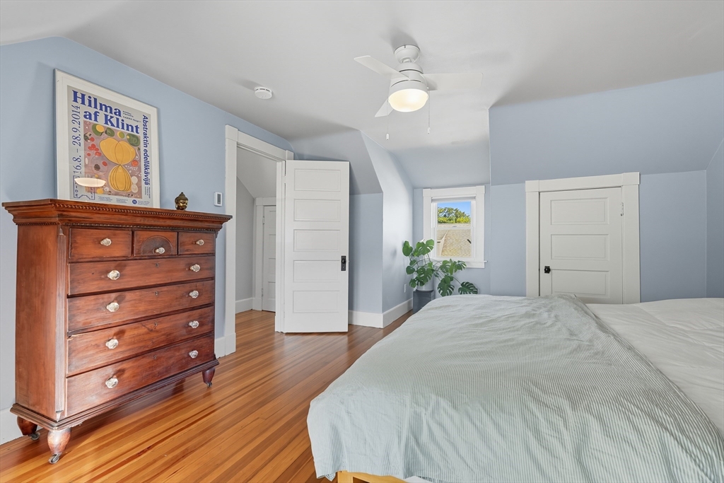 5 Grant Street, Unit 5 Easthampton, MA 01027 - Photo 27 of 36 a bedroom with a bed and a dresser