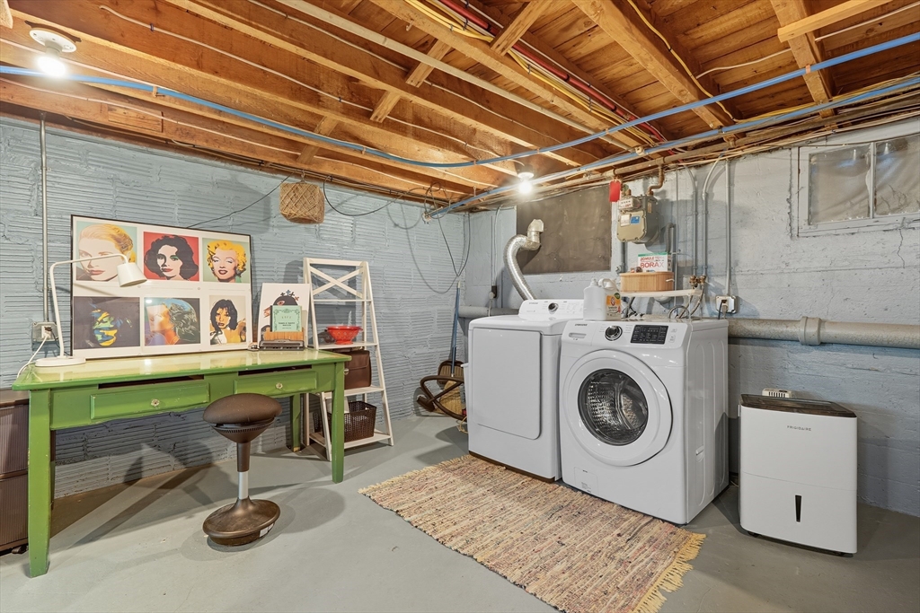 5 Grant Street, Unit 5 Easthampton, MA 01027 - Photo 33 of 36 a utility room with dryer and washer
