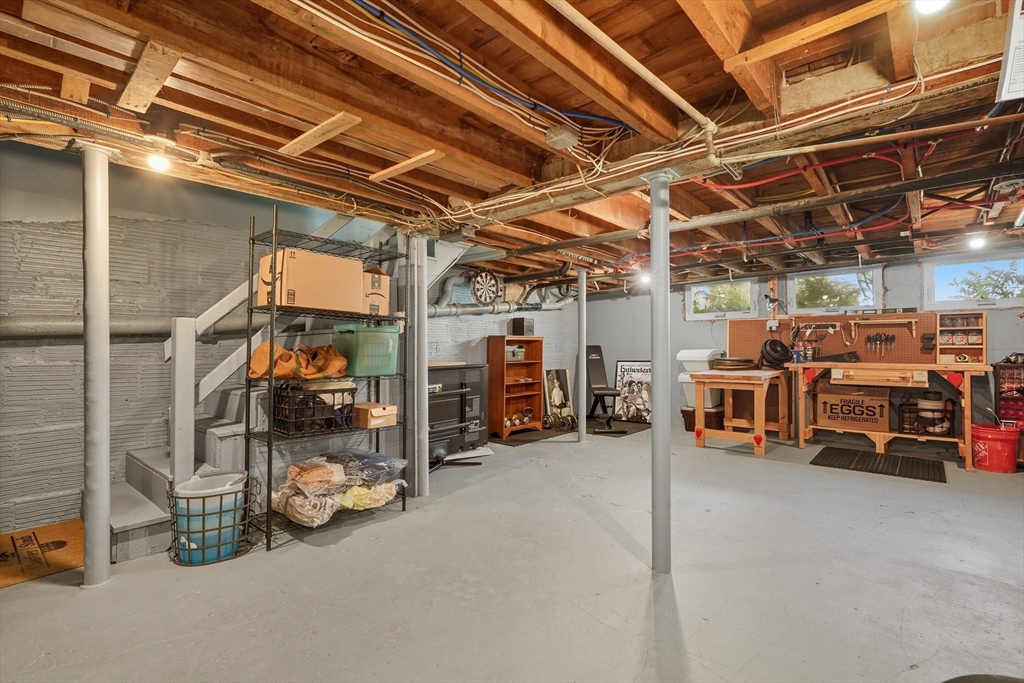 5 Grant Street, Unit 5 Easthampton, MA 01027 - Photo 35 of 36 a view of a garage with parked cars