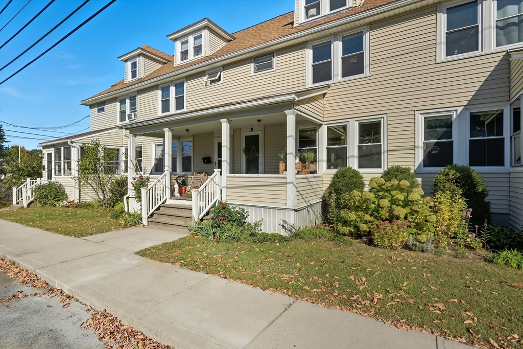 5 Grant Street, Unit 5 Easthampton, MA 01027 - Photo 4 of 36 front view of a house with a yard