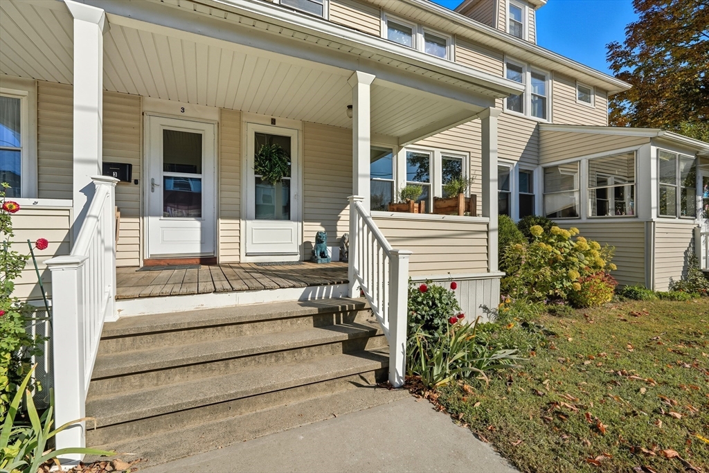 5 Grant Street, Unit 5 Easthampton, MA 01027 - Photo 6 of 36 front view of a house with a porch