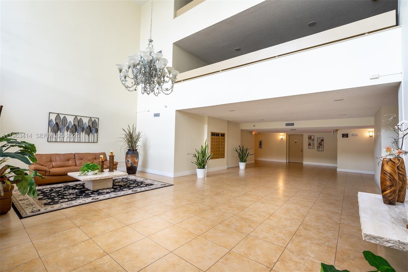 16475 Golf Club Road, Unit 307 Weston, FL 33326 - Photo 24 of 34 Lobby with elevator