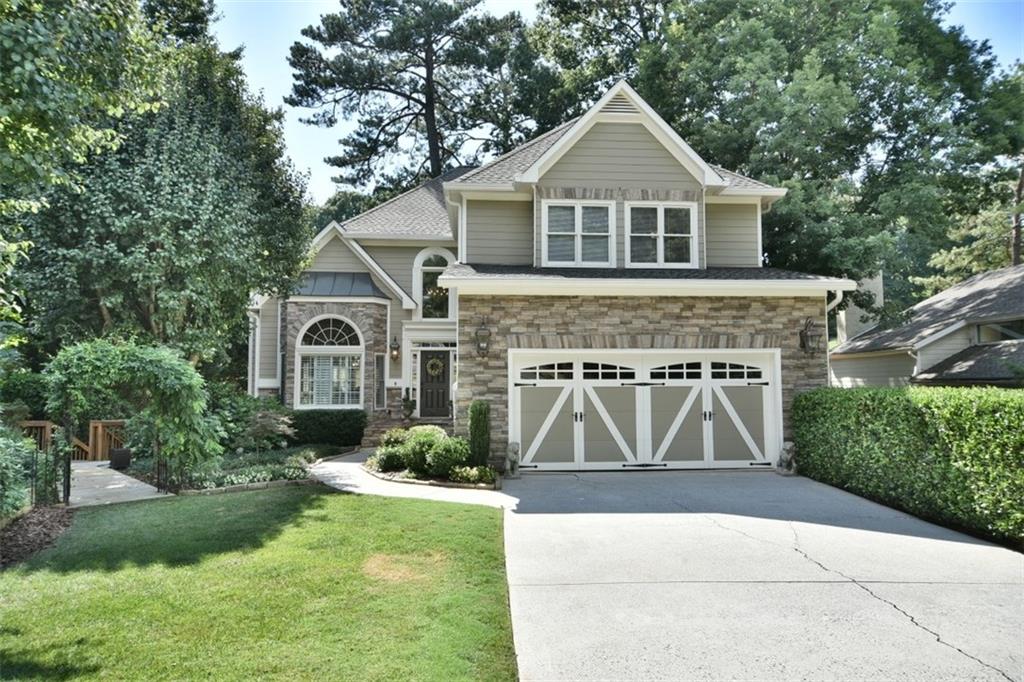 10200 Kinross Road Roswell, GA 30076 - Photo 1 of 1 Gorgeous stone and hardie plank siding.