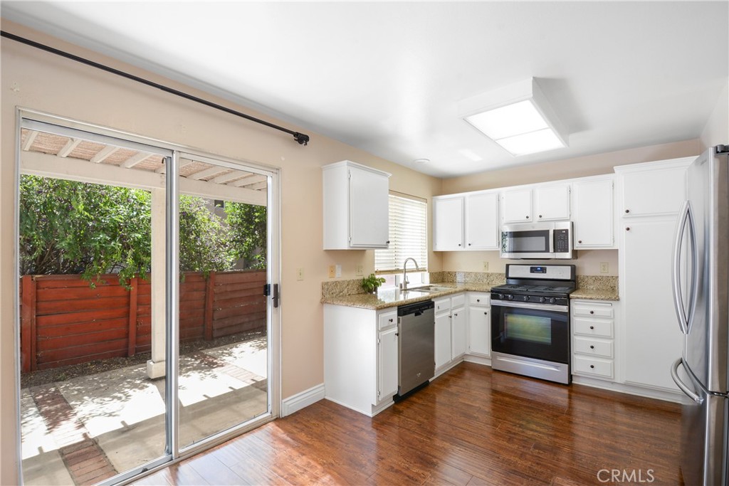 7367 Belpine Place, Unit 45 Rancho Cucamonga, CA 91730 - Photo 3 of 14 Comes with Refrigerator/Stove/Dishwasher/Microwave