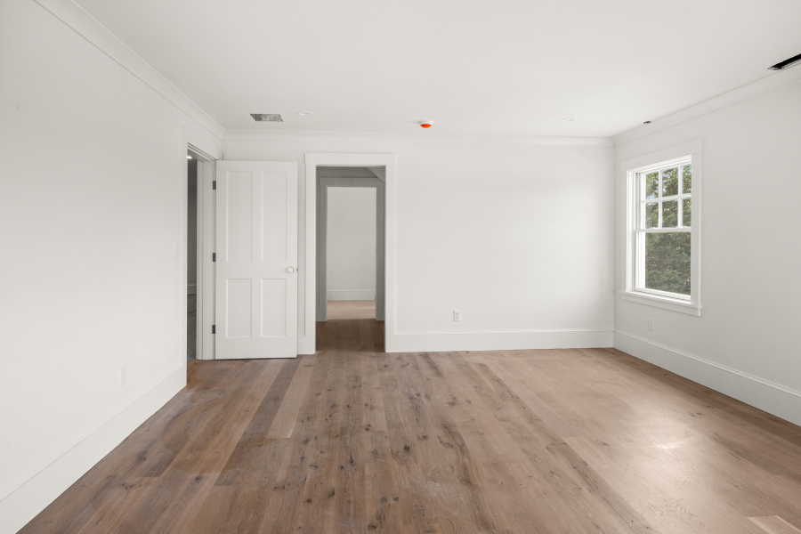 3 Somerset Lane Edgartown, MA 02539 - Photo 16 of 21 an empty room with wooden floor and windows