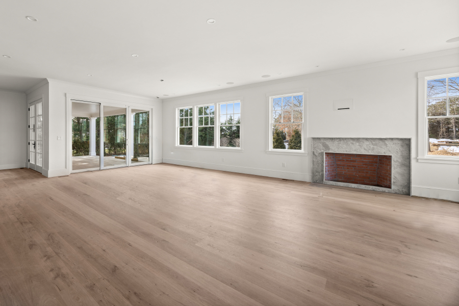 3 Somerset Lane Edgartown, MA 02539 - Photo 4 of 21 an empty room with furniture and a fireplace
