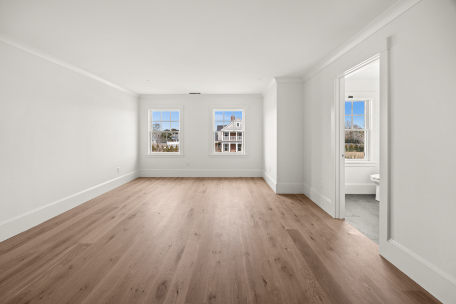 3 Somerset Lane Edgartown, MA 02539 - Photo 8 of 21 an empty room with wooden floor and windows