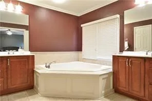 a bathroom with a bathtub and a sink