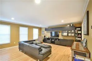 a living room with furniture window and a table