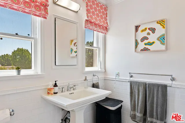 a bathroom with a toilet and a sink