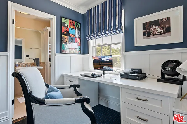 a view of a house with backyard porch and sitting area