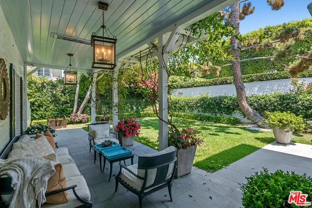 a view of swimming pool with outdoor seating