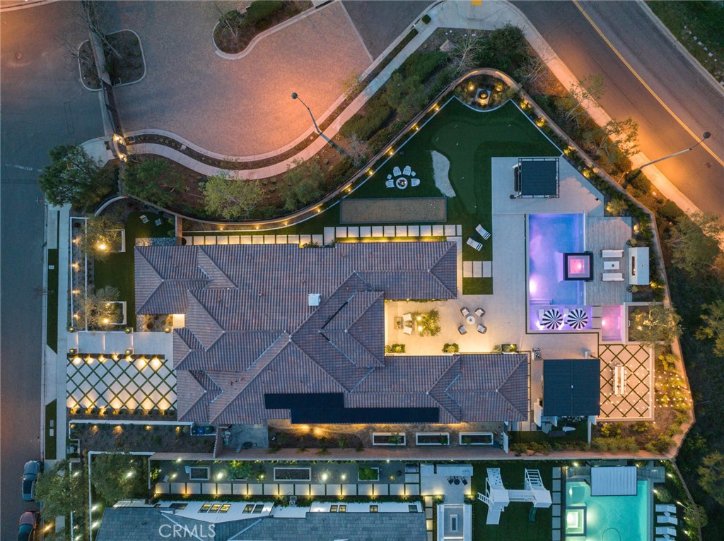 an aerial view of a building with garden