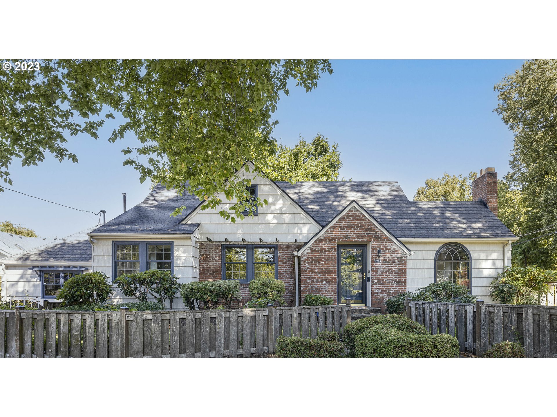 a house view with a garden
