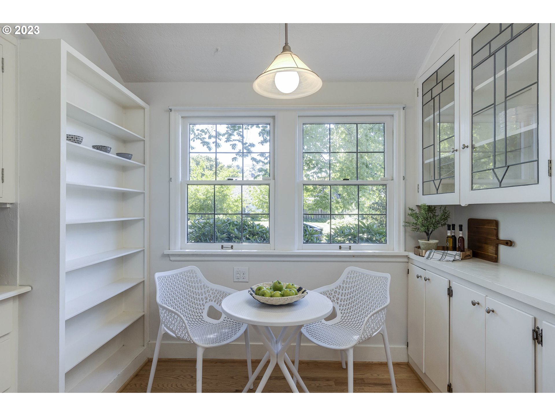3227 Southeast Lambert Street Portland, OR 97202 - Photo 16 of 44 a kitchen with a table and chairs