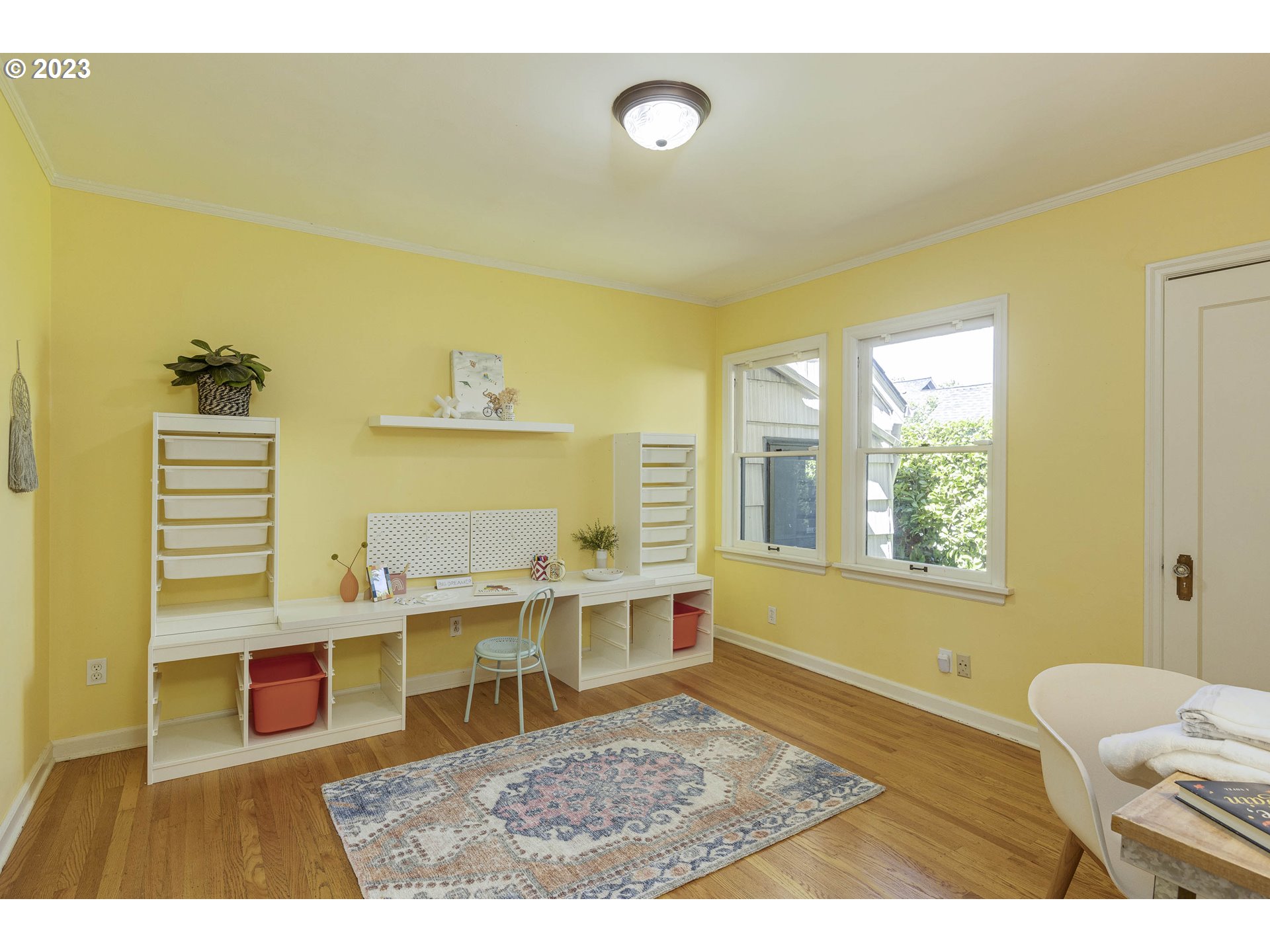 3227 Southeast Lambert Street Portland, OR 97202 - Photo 24 of 44 a living room with a table and a window