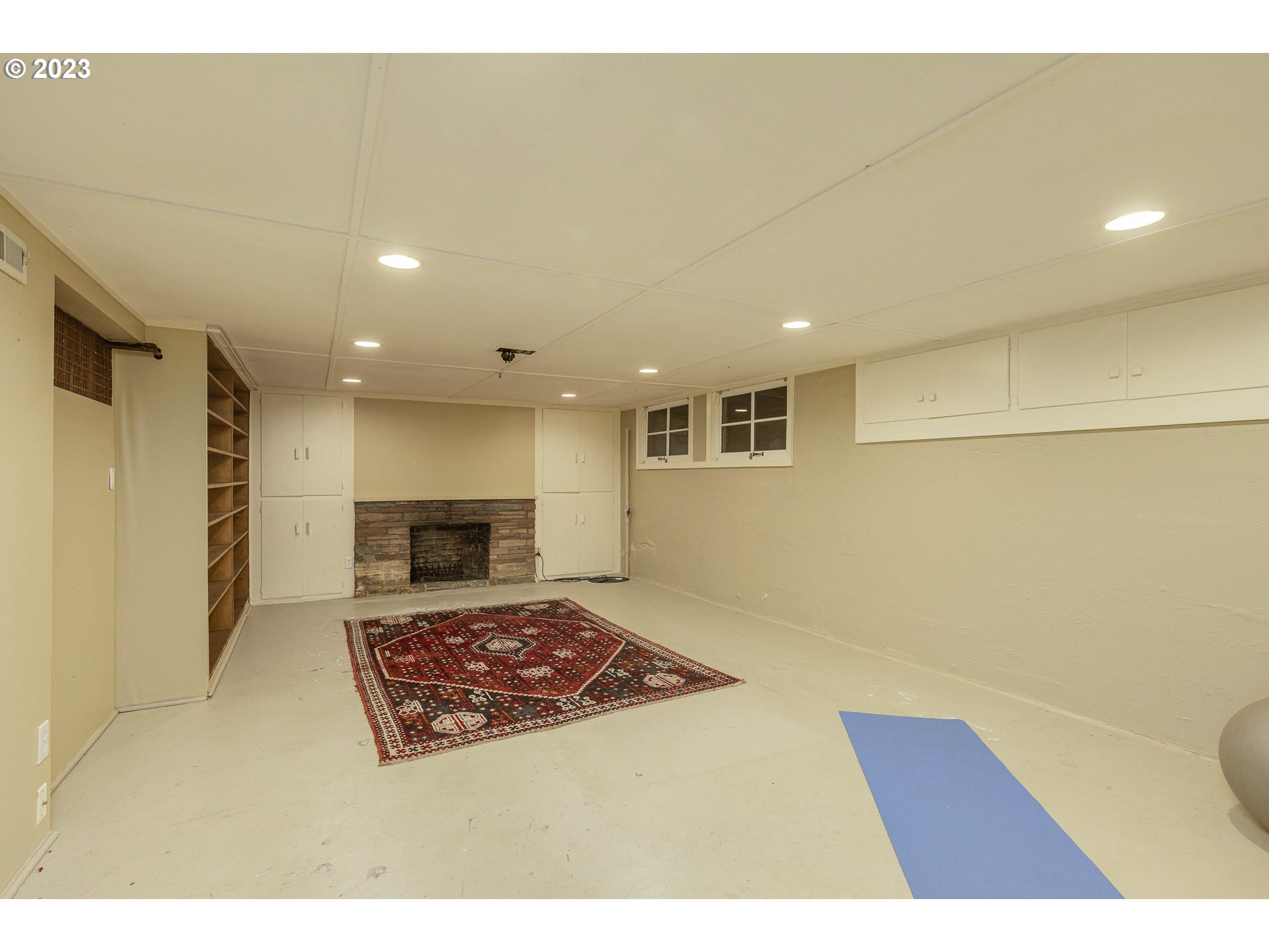 3227 Southeast Lambert Street Portland, OR 97202 - Photo 34 of 44 a living room with a rug and a rug