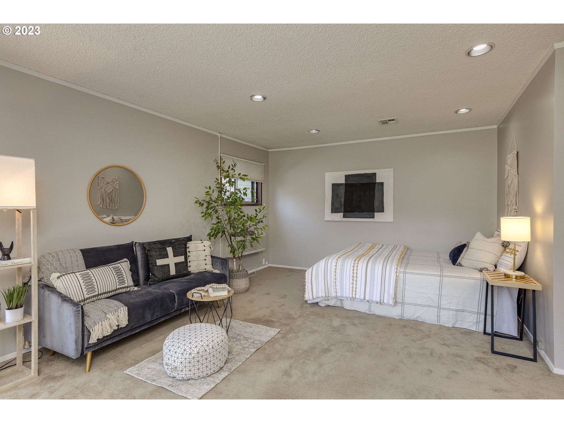 3227 Southeast Lambert Street Portland, OR 97202 - Photo 38 of 44 a living room with furniture and a potted plant