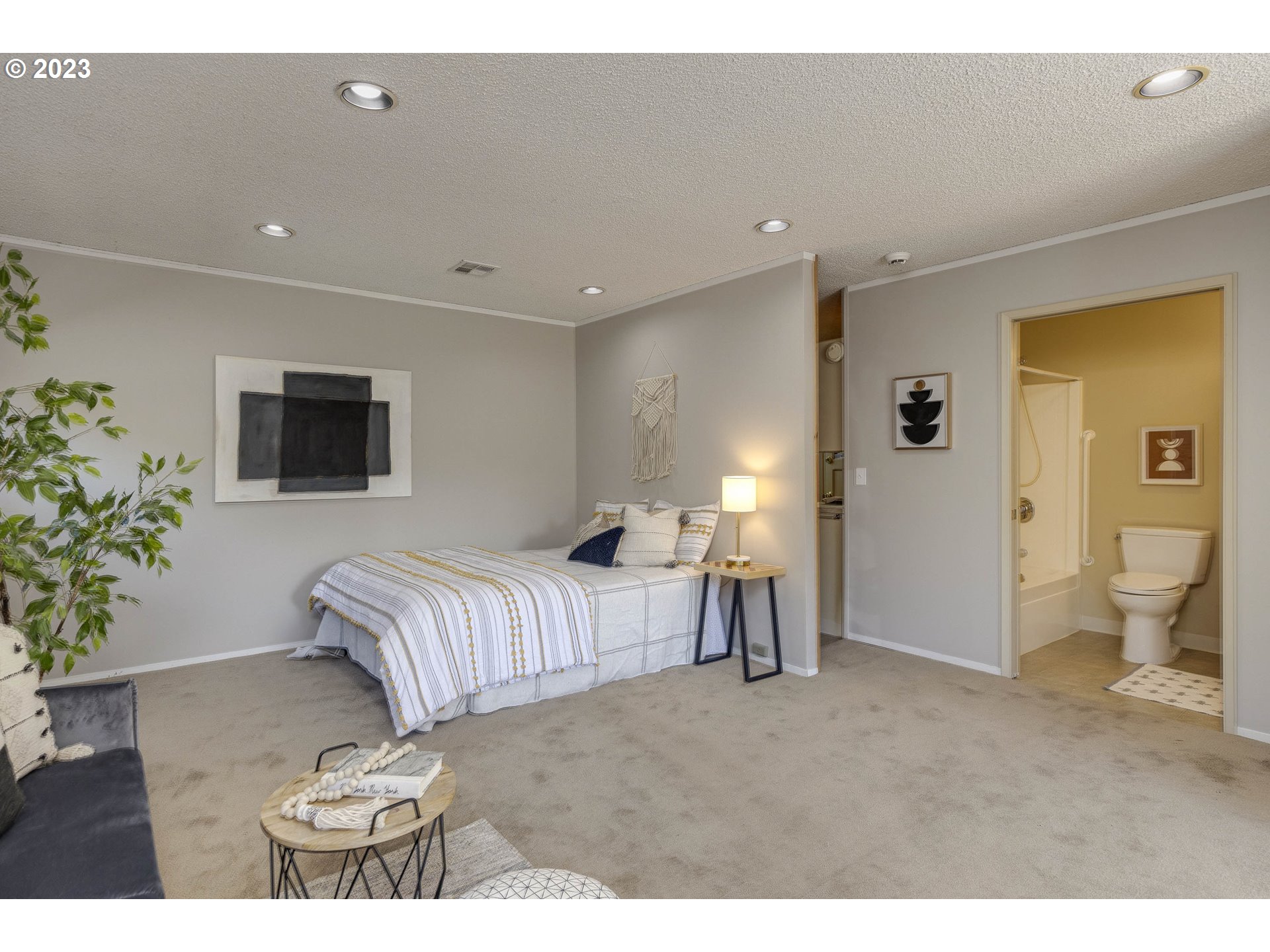 3227 Southeast Lambert Street Portland, OR 97202 - Photo 39 of 44 a living room with furniture and a flat screen tv