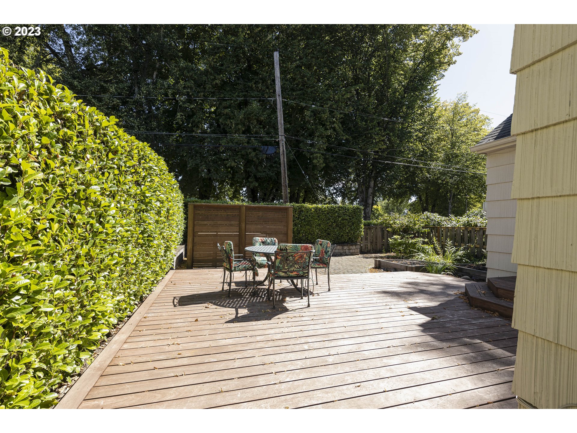 3227 Southeast Lambert Street Portland, OR 97202 - Photo 44 of 44 a view of a patio with a table and chairs