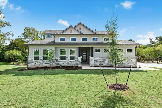 a house view with a garden space