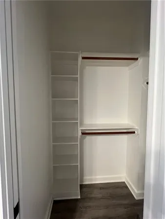 a view of an empty walk in closet
