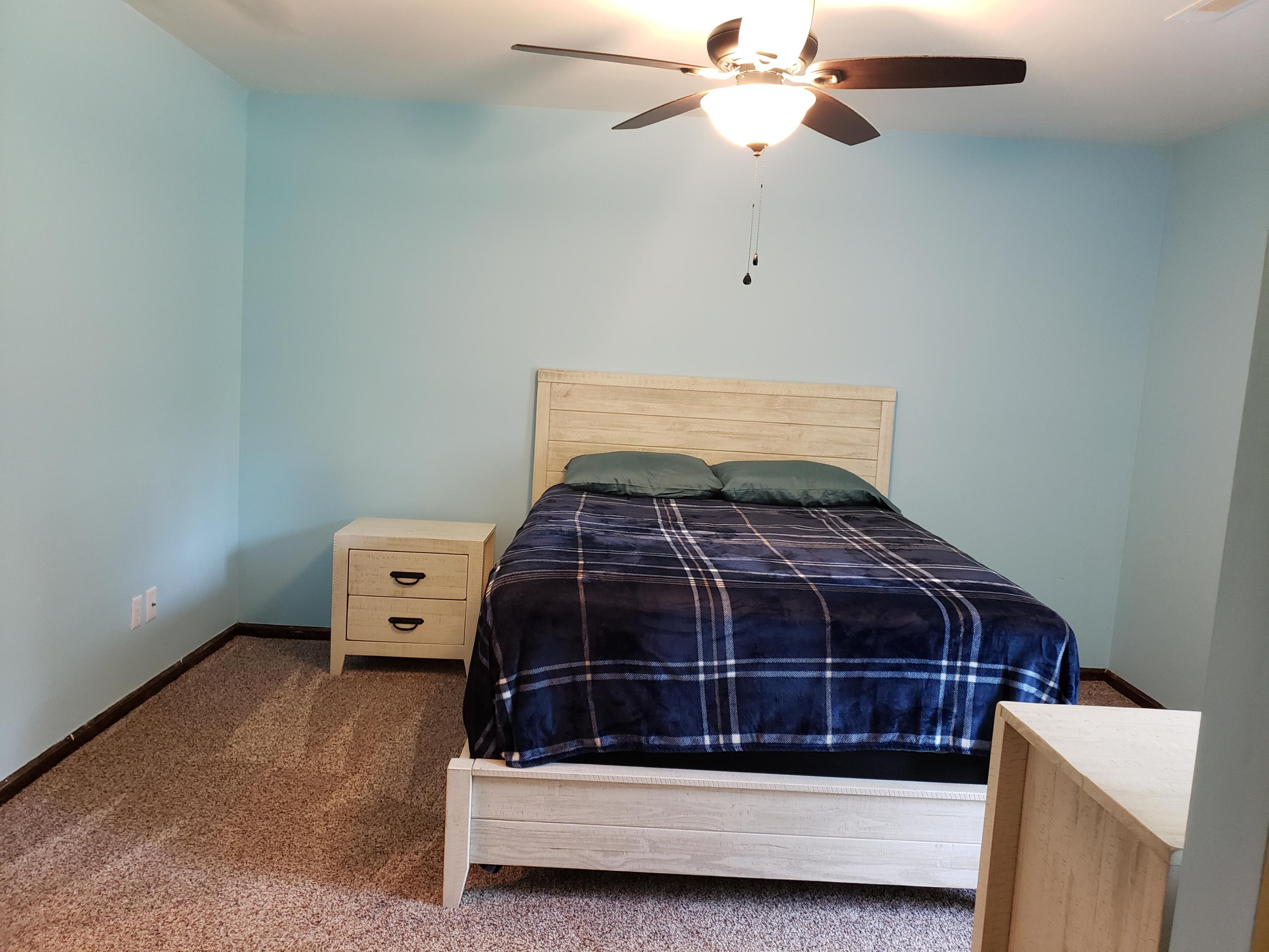 205 Ruffin Road Summerville, SC 29486 - Photo 11 of 21 Master bedroom has a ceiling fan.