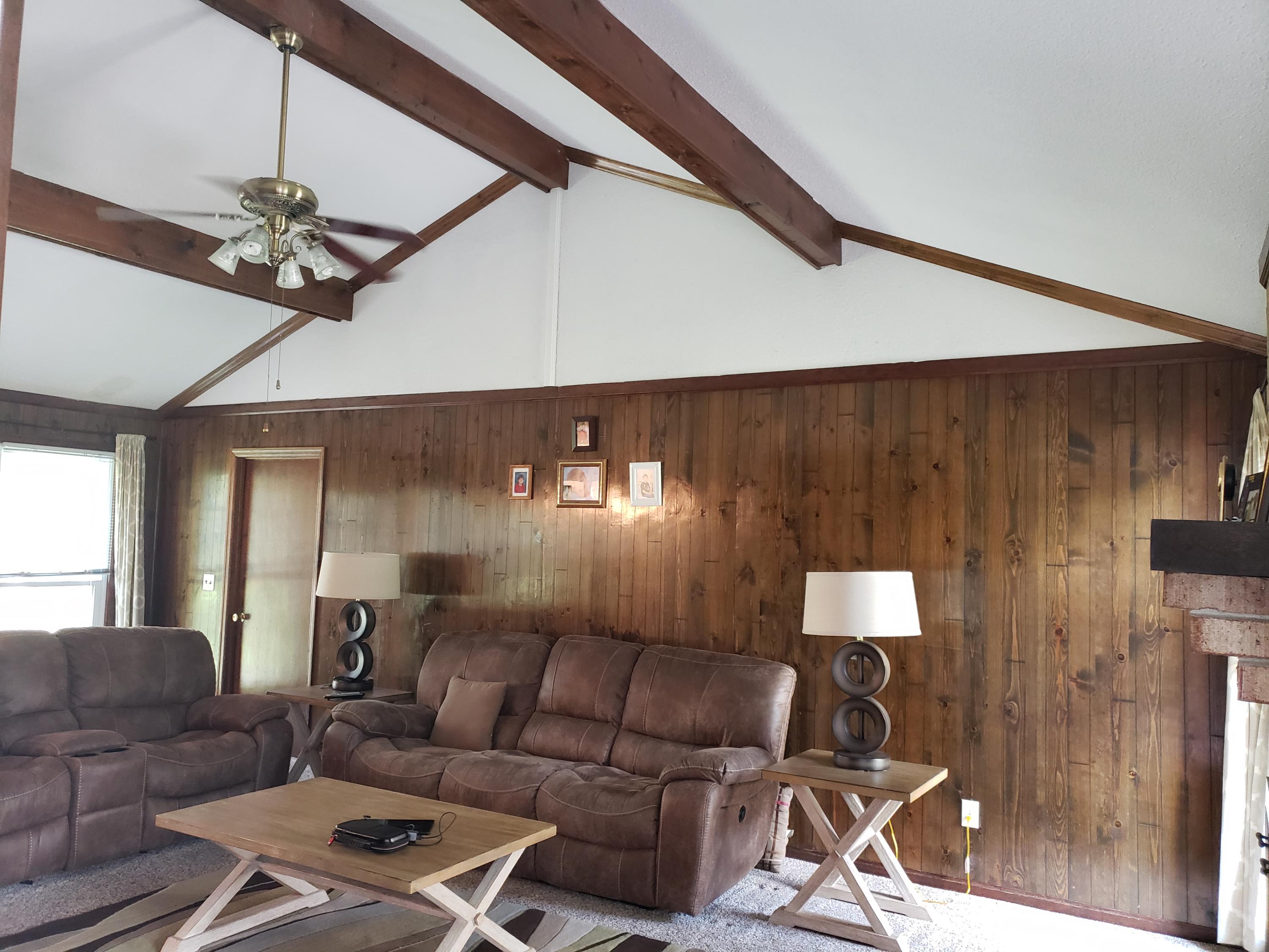 205 Ruffin Road Summerville, SC 29486 - Photo 4 of 21 Living room has exposed beams
