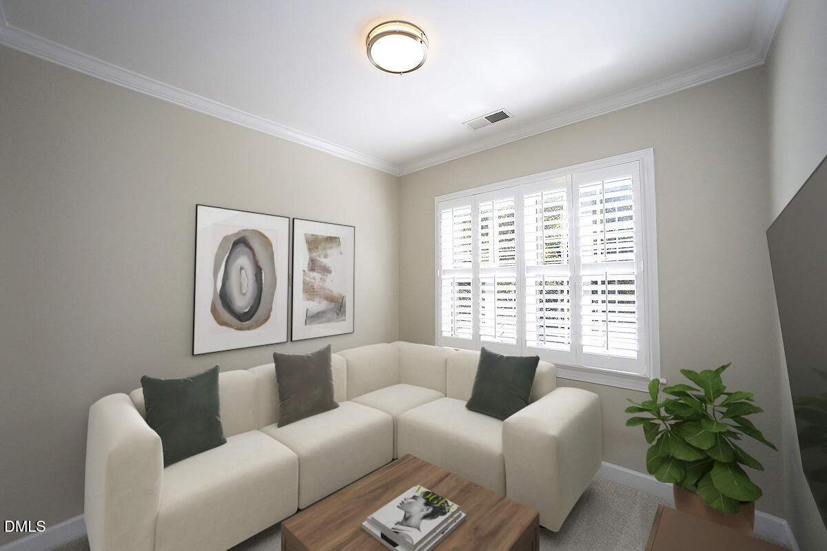 100 Northbrook Drive, Unit 207 Raleigh, NC 27609 - Photo 20 of 39 a living room with furniture and a large window
