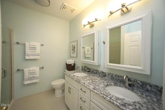 a bathroom with a shower and bathtub