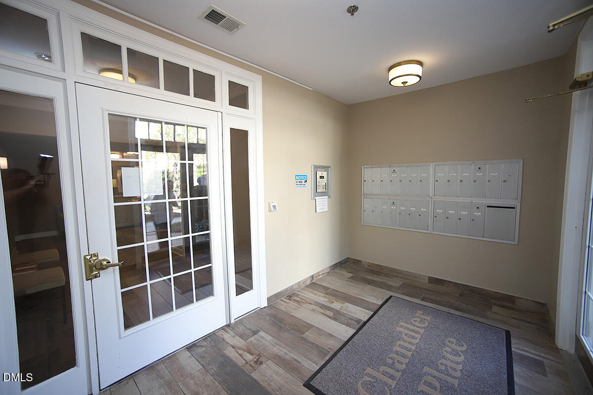 100 Northbrook Drive, Unit 207 Raleigh, NC 27609 - Photo 4 of 39 a view of empty room with windows