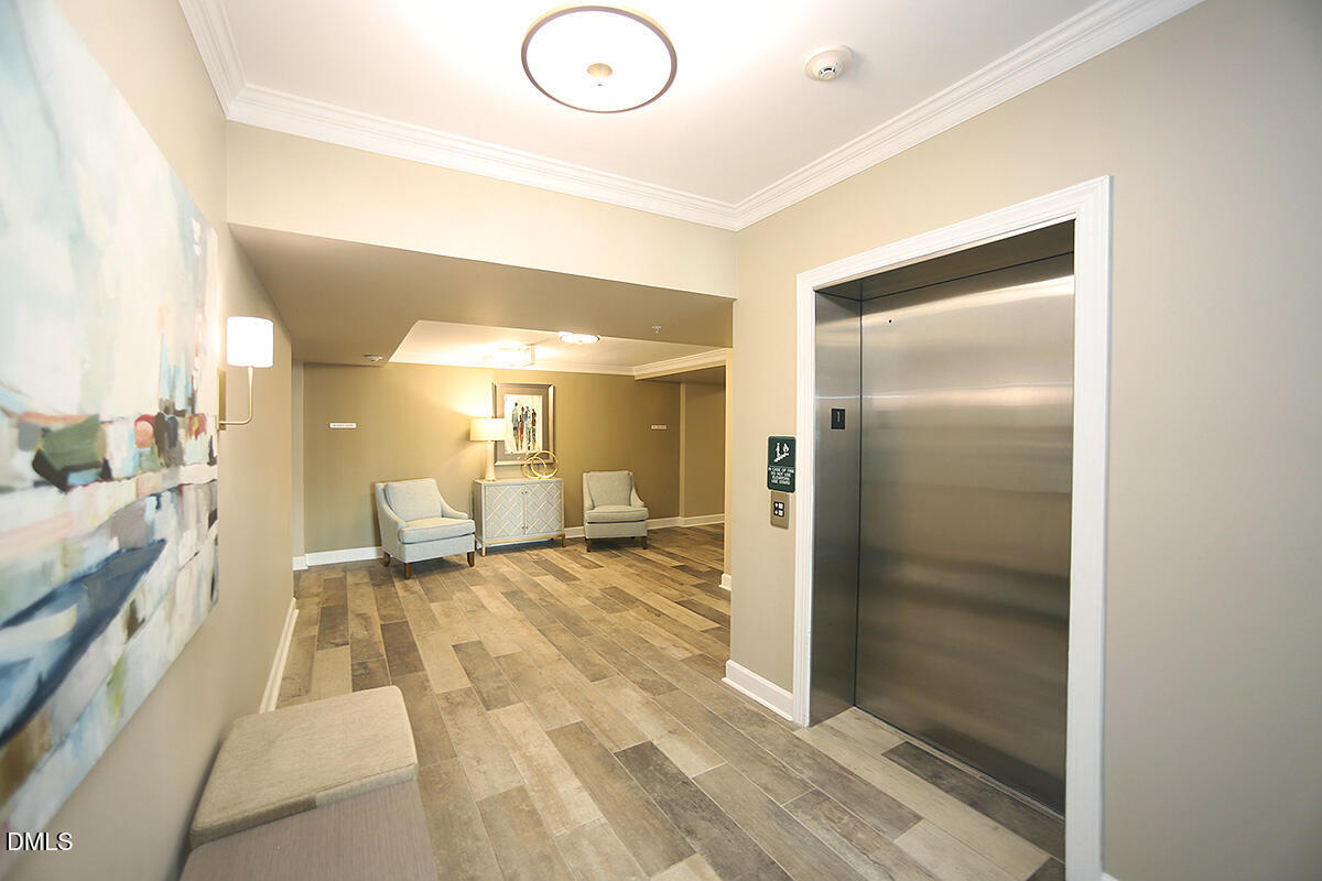 100 Northbrook Drive, Unit 207 Raleigh, NC 27609 - Photo 5 of 39 a bathroom with a sink and a mirror