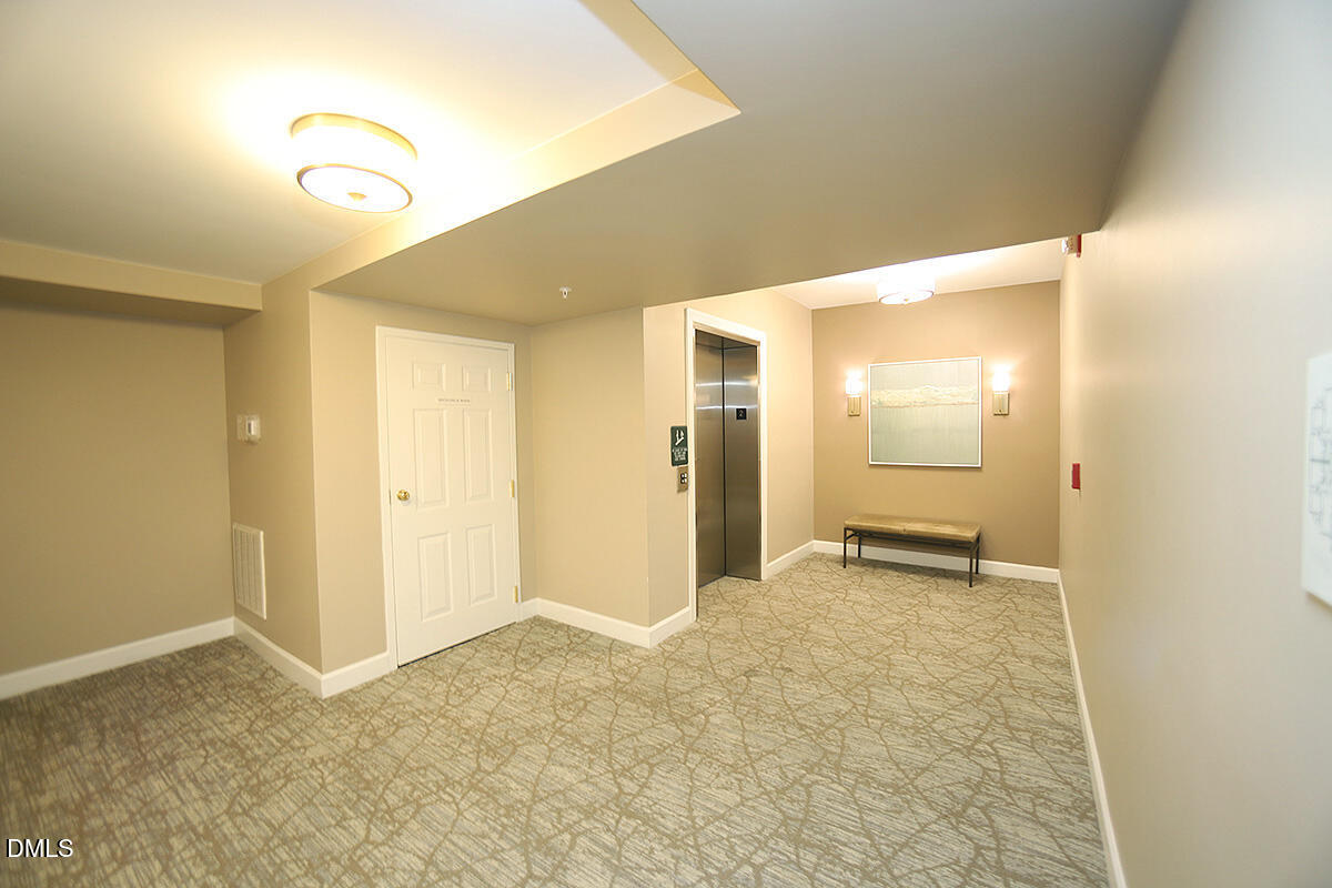 100 Northbrook Drive, Unit 207 Raleigh, NC 27609 - Photo 7 of 39 a view of an empty room