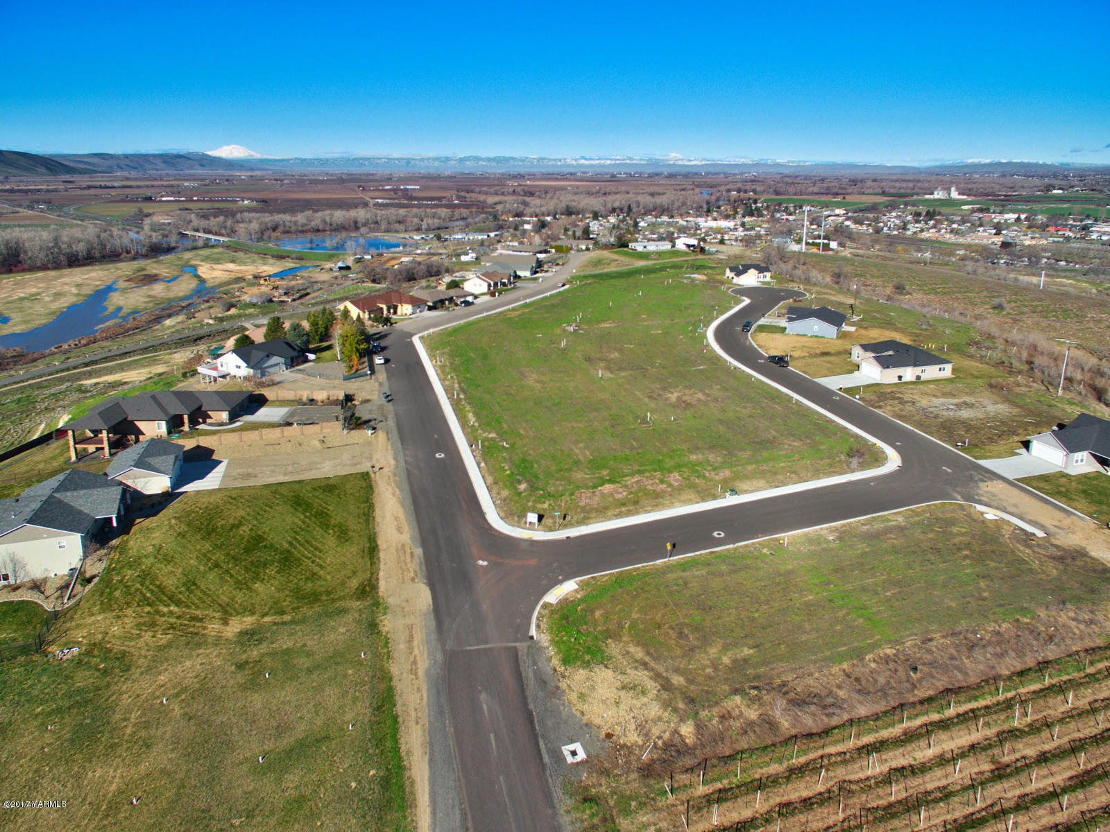 Nna Bagley Road, Unit 5 Granger, WA 98932 - Photo 1 of 1 an aerial view of residential houses with outdoor space